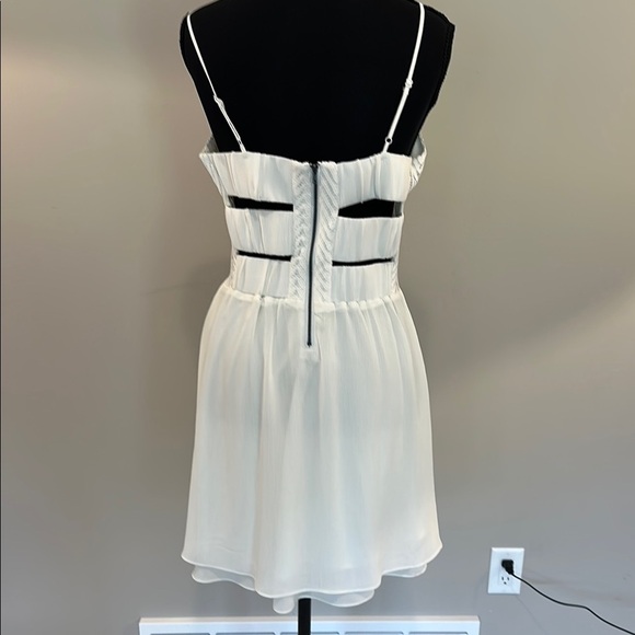 Elegant White Spaghetti Strap Dress - Picture 2 of 6